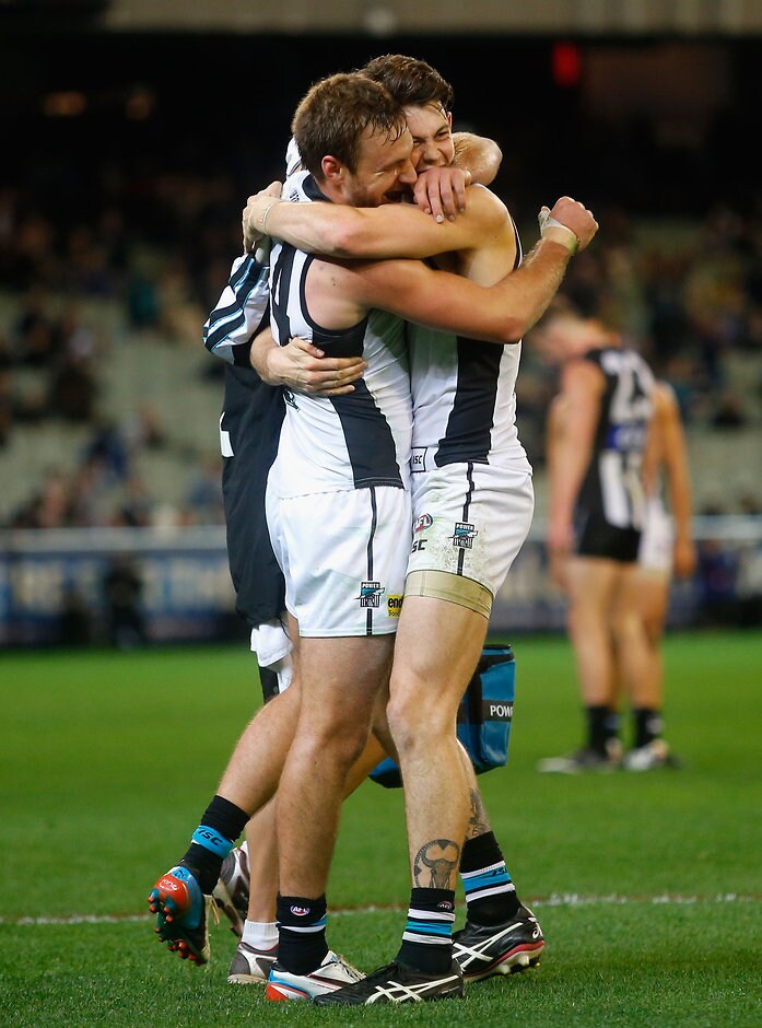AFL 2013 2nd Elimination Final - Collingwood v Port Adelaide Tom Logan and Jasper Pittard the Power celebrate their win in the 2013 2nd Elimination Final match between the Collingwood Magpies and Port Adelaide Power at the MCG, Melbourne on September 07, 2013. (Photo: Lachlan Cunningham/AFL Media)